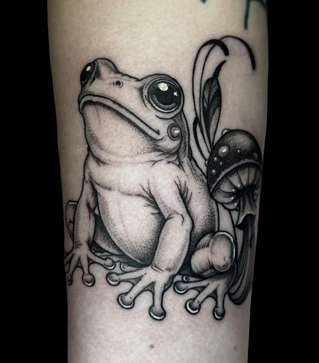 Black and white frog tattoo