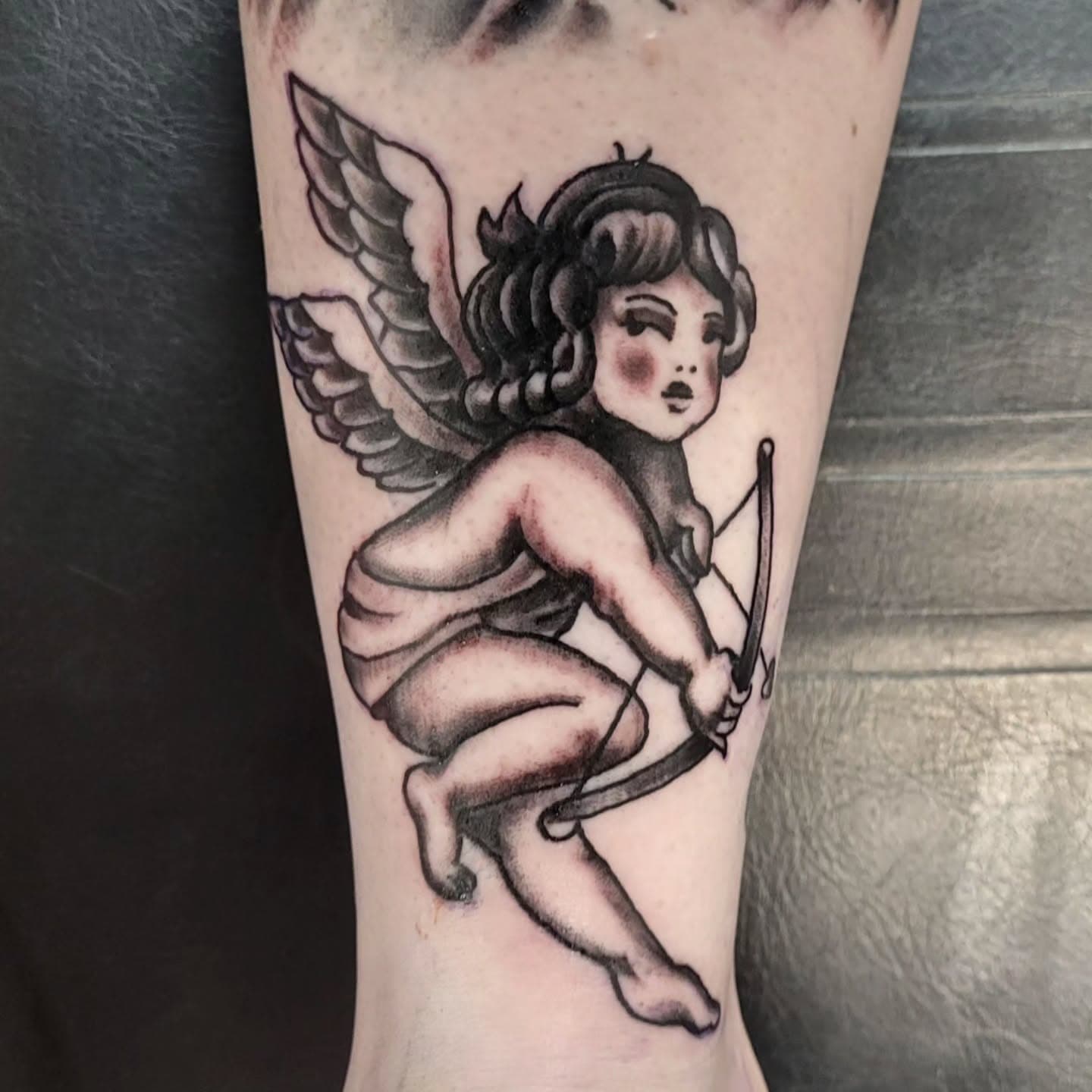 Cherub baby tattoo