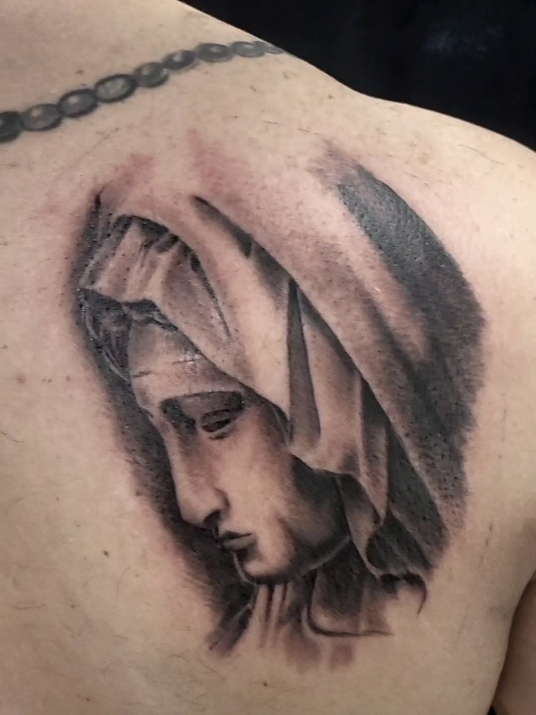 Virgin Mary tattoo